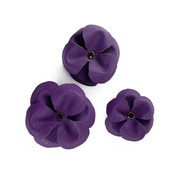 three purple dog flower collar sliders